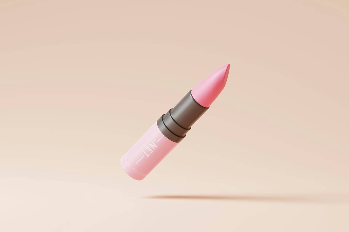 Artist using fine-tip lip crayon to dot precise points on lips before connecting