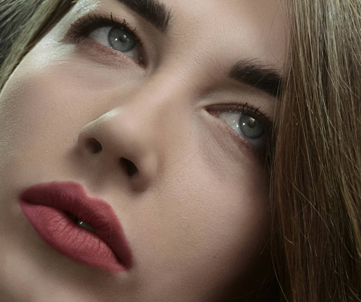 Before and after using lip sculpting color to enhance fullness and symmetry