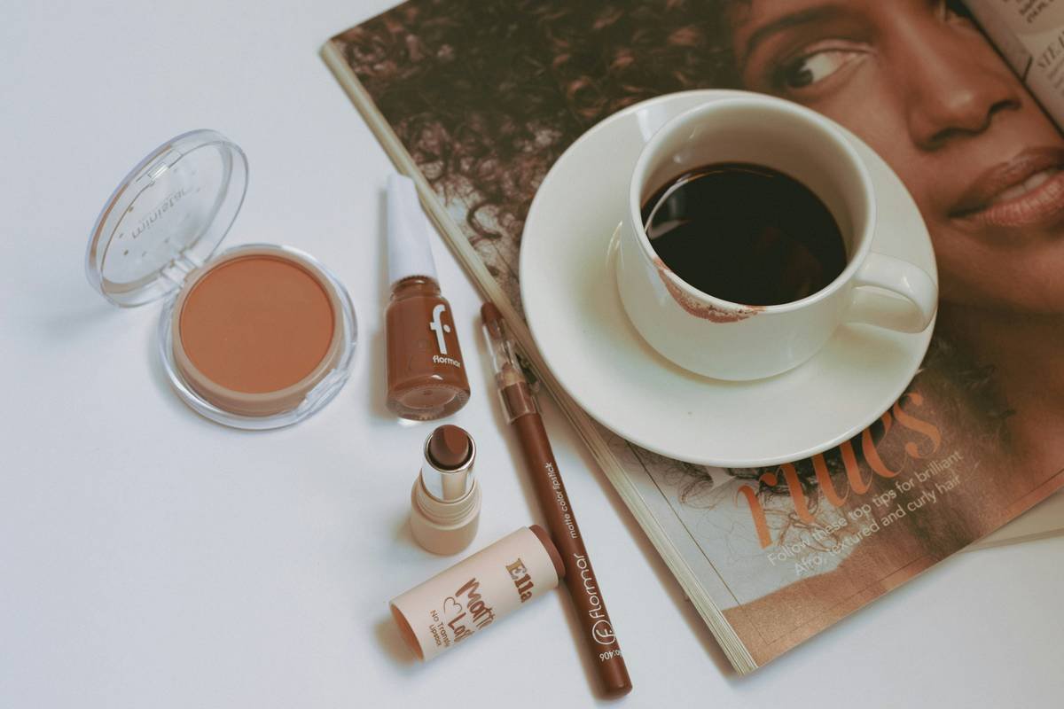 precision lip color being applied to define natural lip shape with soft blending at the edges